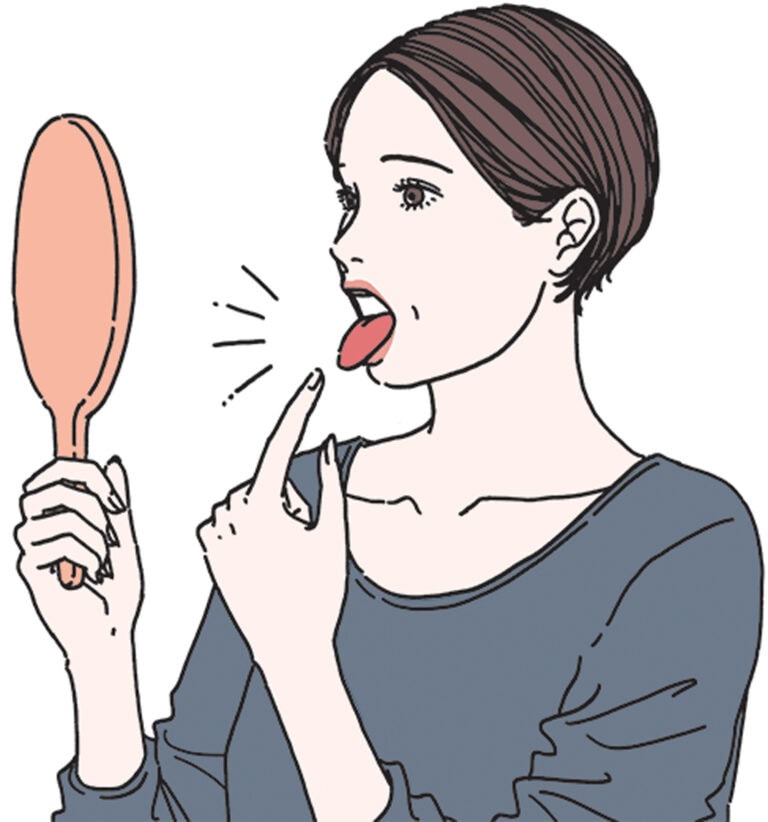 鏡の前で舌を出して色をチェック。