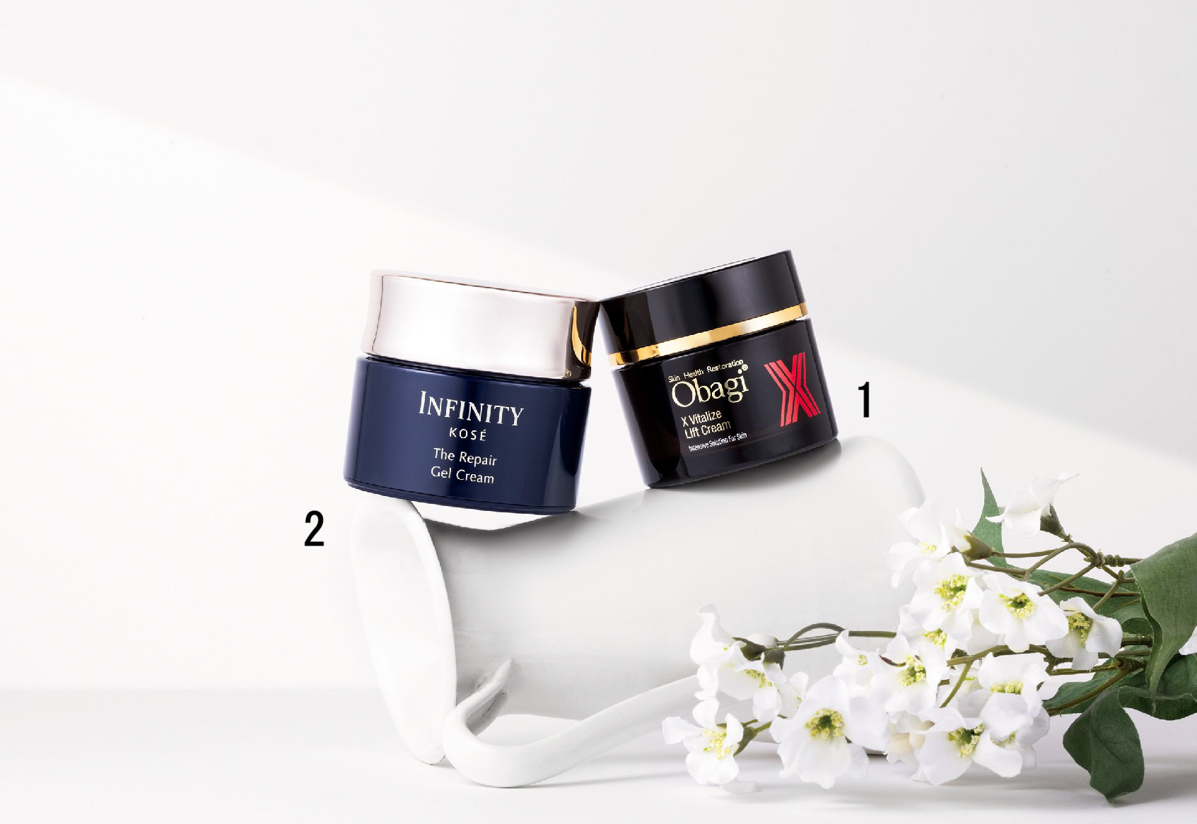 オバジX バイタライズ リフトクリーム 50g ¥11,000／ロート製薬、インフィニティ ザ  リペア ジェルクリーム［医薬部外品］ 80g ¥9,900（編集部調べ）／コーセー
