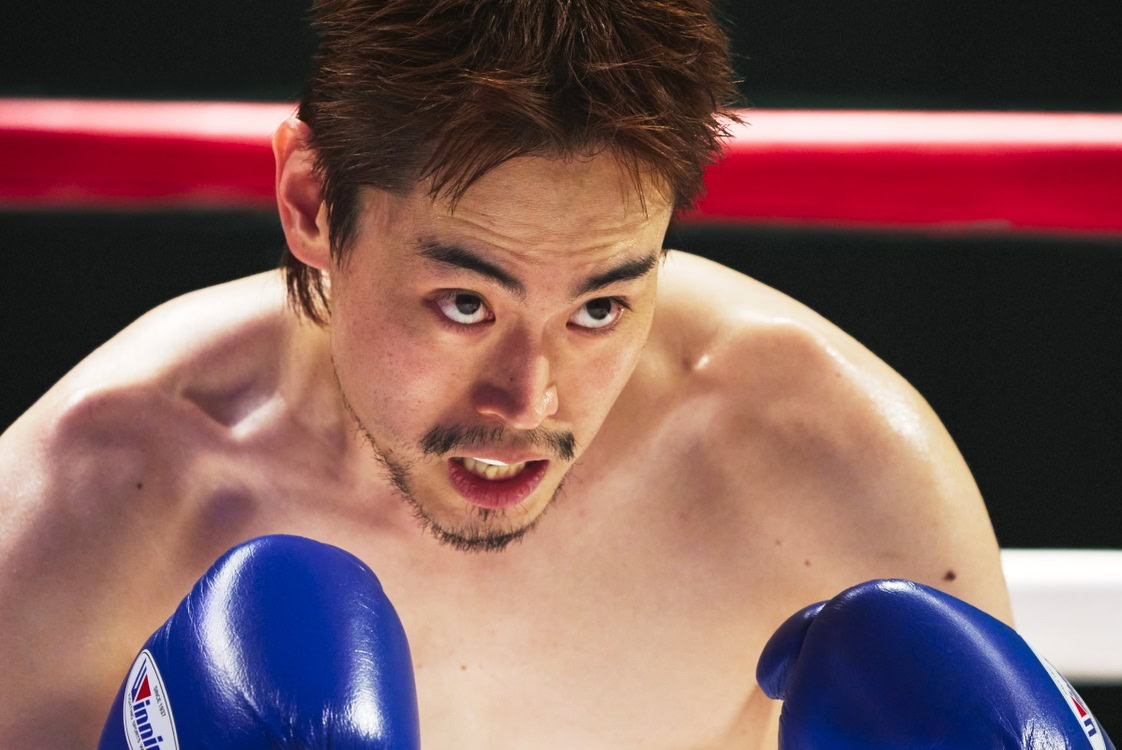 映画『人はなぜラブレターを書くのか』より信介の思いを背負って試合に挑む川嶋勝重（菅田将暉）